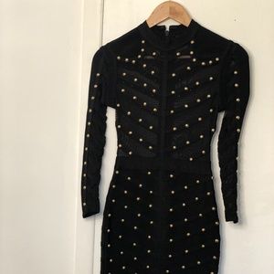 Black studded body con dress